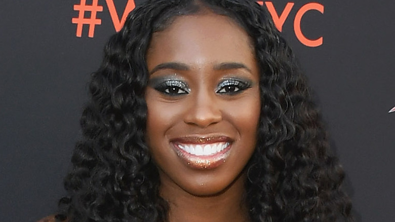 Trinity Fatu posing on the red carpet