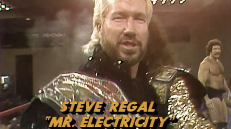 Steve Regal shows off his AWA Tag Team Title belt