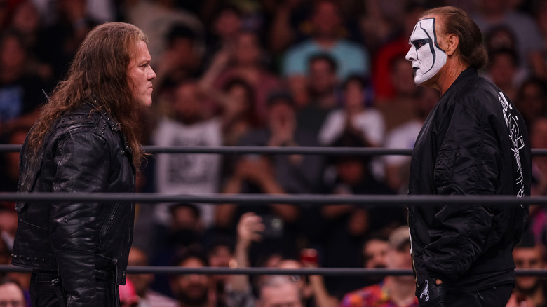 Sting and Chris Jericho staring at each other