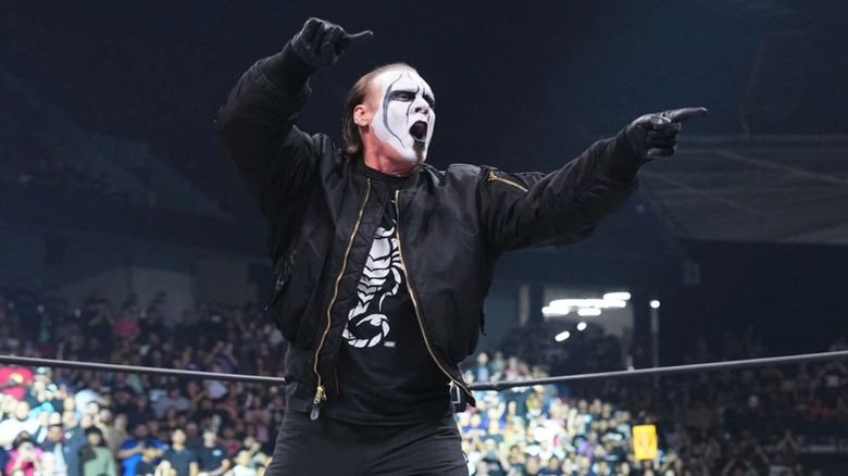 Sting does that point thing he's liked to do ever since he was in the Wolfpac