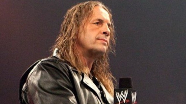 Bret Hart holding a WWE mic