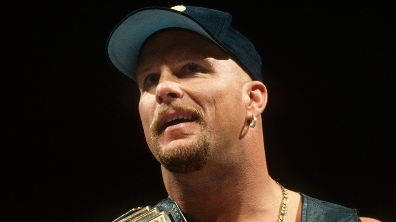 Stone Cold Steve Austin with championship on his shoulder