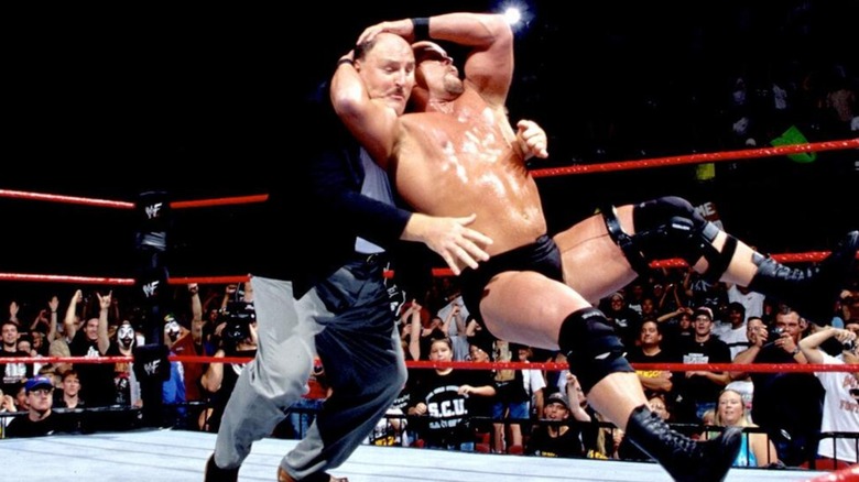 Stone Cold Steve Austin hits the Stunner on Sgt. Slaughter