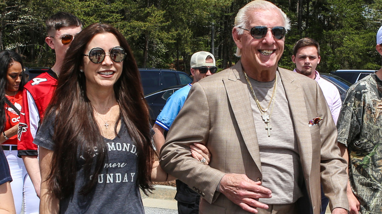 Ric Flair and Wendy Barlow arrive at Huncho Day at Berkmar High School on April 1, 2018 in Lilburn, Georgia.