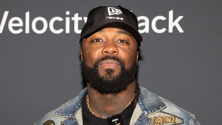 Swerve Strickland wearing a New Era hat