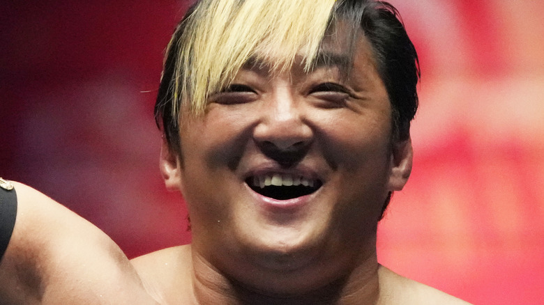 Taichi smiling during his match in New Japan Pro-Wrestling