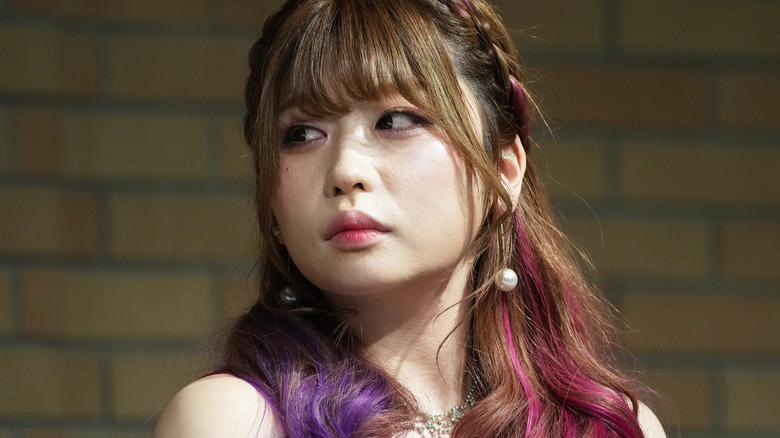 Tam Nakano glaring to the side at a STARDOM press conference