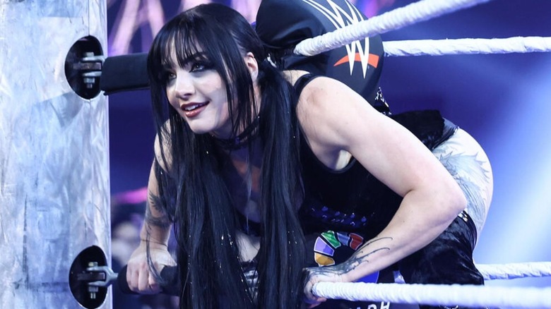 Tatum Paxley leanign against the ring ropes