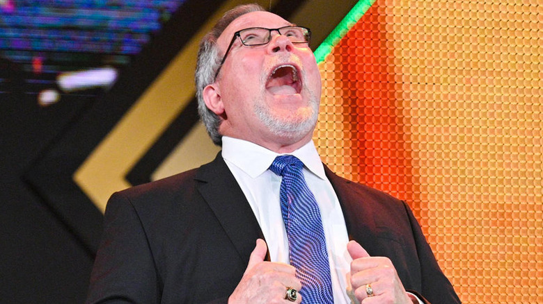 Ted Dibiase doing his trademark laughing