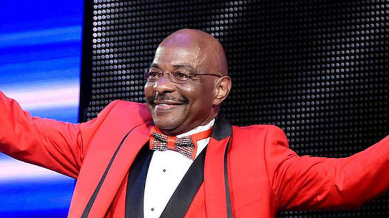 Teddy Long does big arms