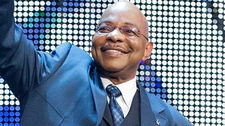 Teddy Long smiling 