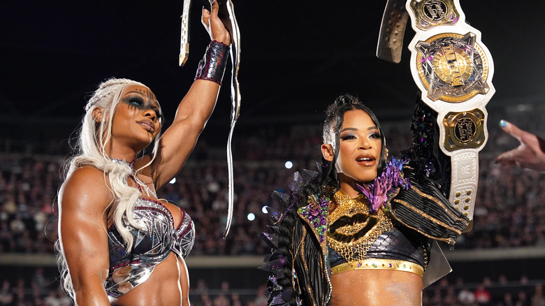 Jade Cargill and Bianca Belair with tag titles