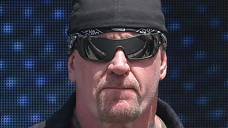 The Undertaker wearing sunglasses