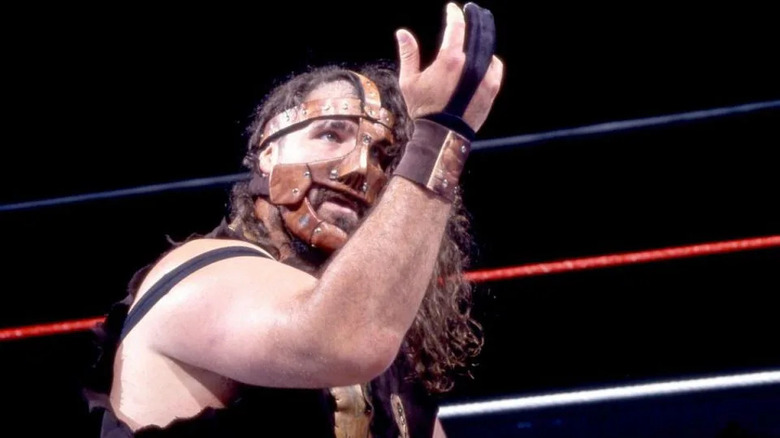 Mankind raised arm