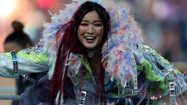 IYO SKY wearing a light blue ring jacket