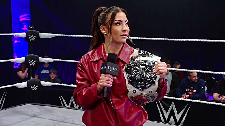 Kendal Grey poses with the Evolve Women's Title