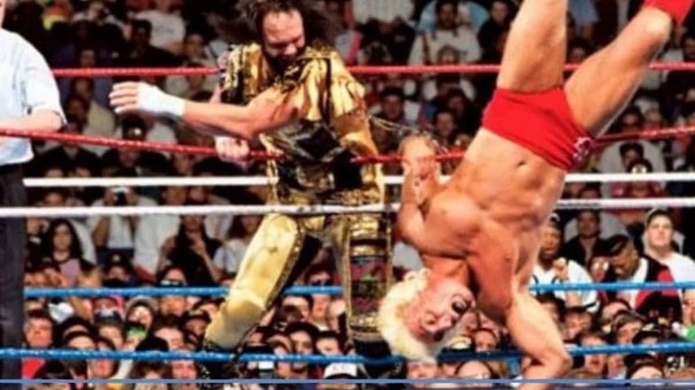 Randy Savage clotheslines Ric Flair