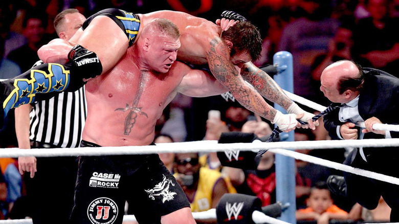 Brock Lesnar, CM Punk and Paul Heyman 