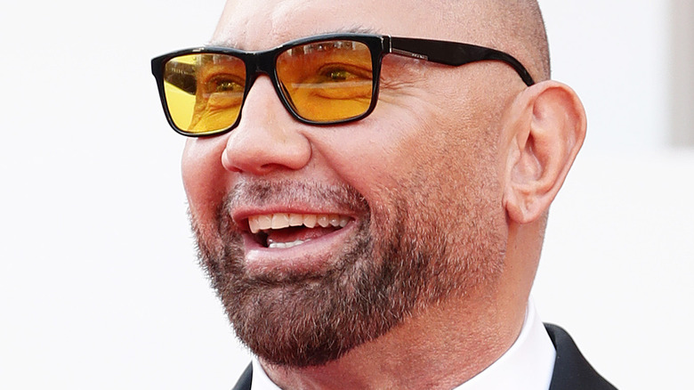 Dave Bautista poses and smiles