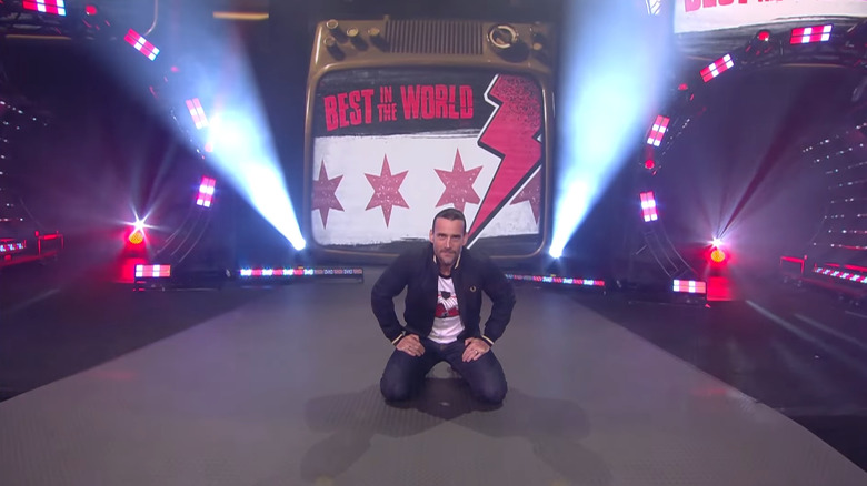 CM Punk kneeling