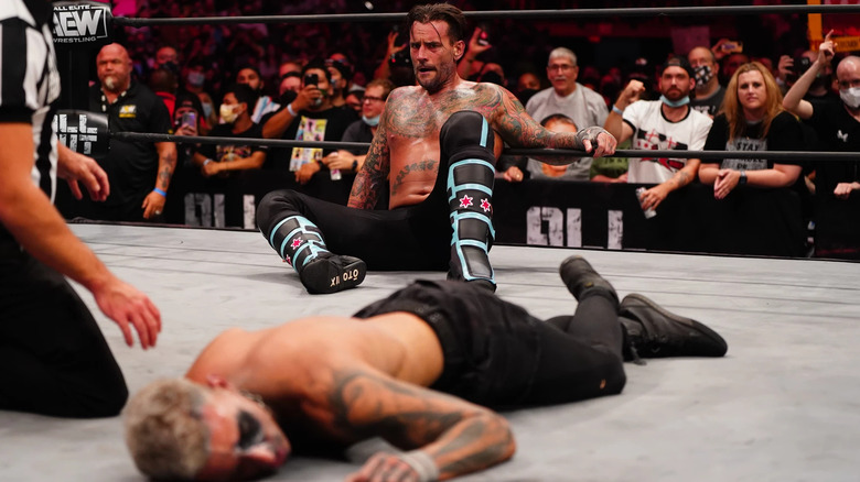 CM Punk and Darby Allin at AEW All Out 2021
