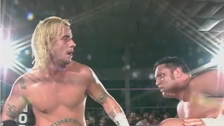 Punk and Joe exchanging blows