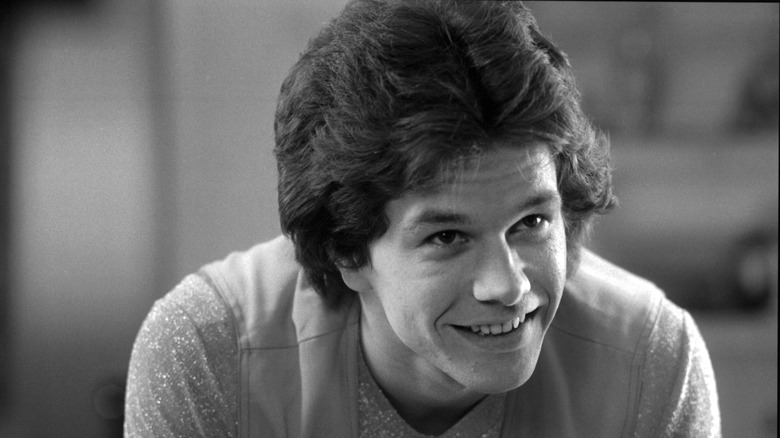 Mark Whalberg, smiling in Boogie Nights
