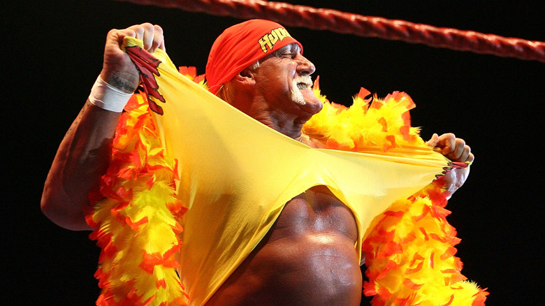 Hulk Hogan rips his shirt prior to the bout against Ric Flair during his Hulkamania Tour at the Burswood Dome on November 24, 2009 in Perth, Australia.