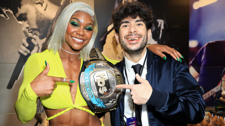 TBS Champion Jade Cargill with Tony Khan