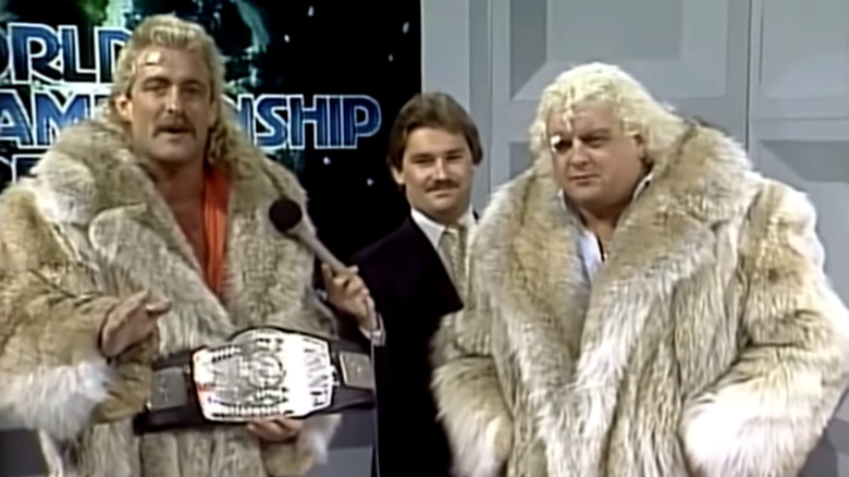 Magnum T.A., Tony Schiavone, and Dusty Rhodes in 1985