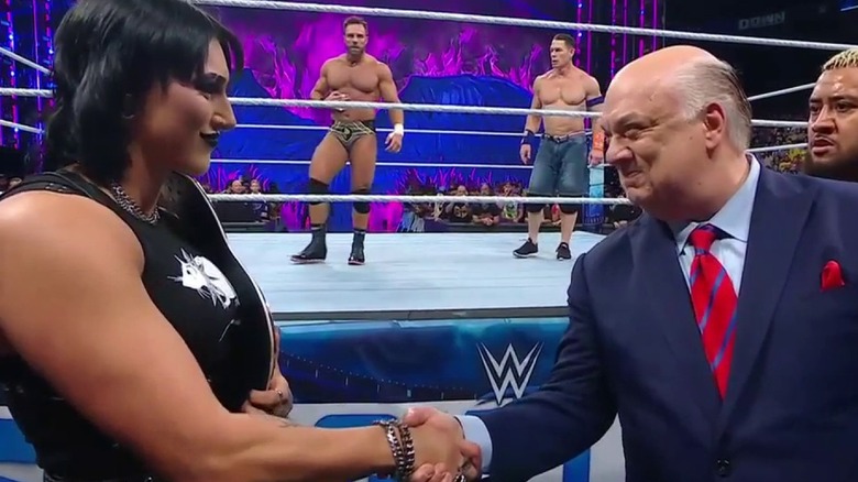 Rhea Ripley and Paul Heyman shaking hands