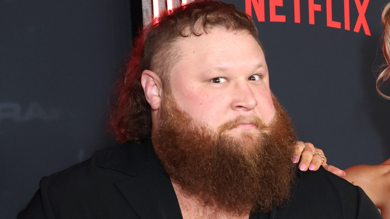 Otis, Maxxine Dupri and Akira Tozawa attend Netflix's Debut of WWE Monday Night Raw at Intuit Dome on January 06, 2025 in Inglewood, California.