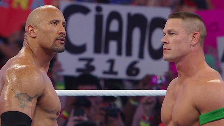 The Rock and John Cena get ready to square off.