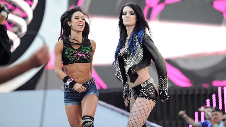 AJ Lee and Paige make an entrance together at WrestleMania.