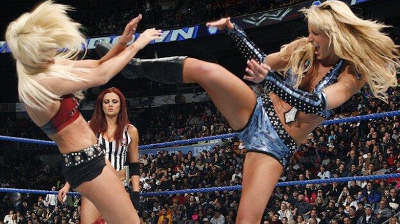 Michelle McCool blasts Maryse with a kick.