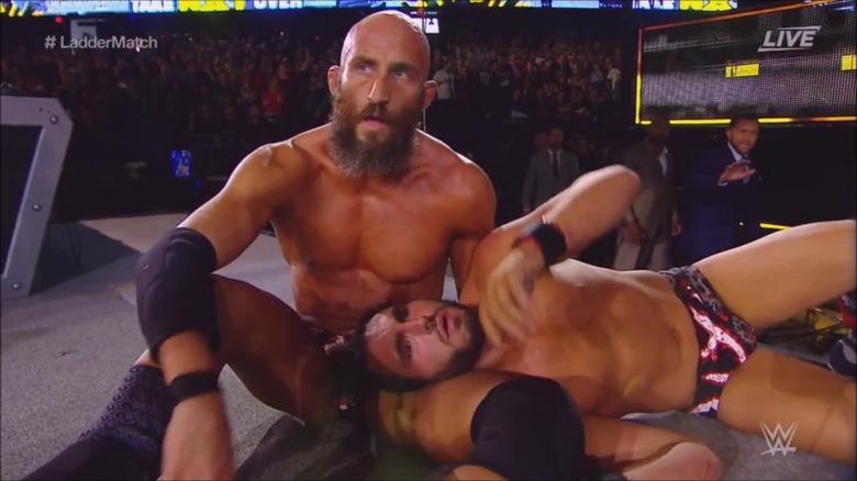Ciampa cradling Gargano in his arms
