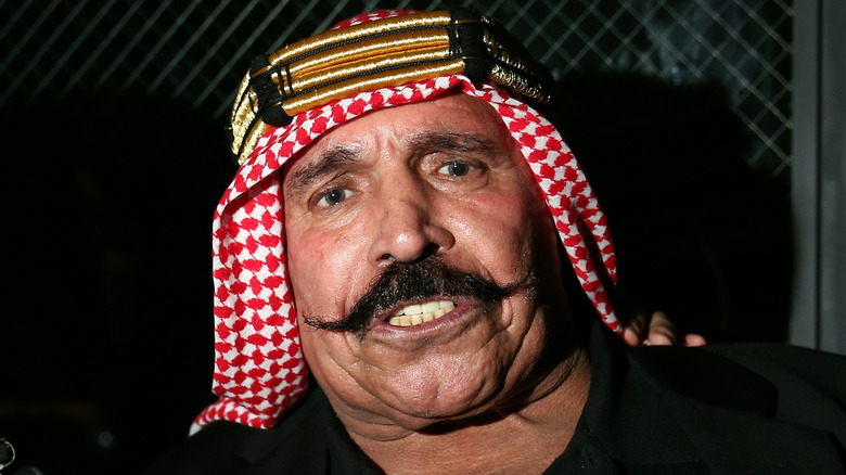 The Iron Sheik bares teeth