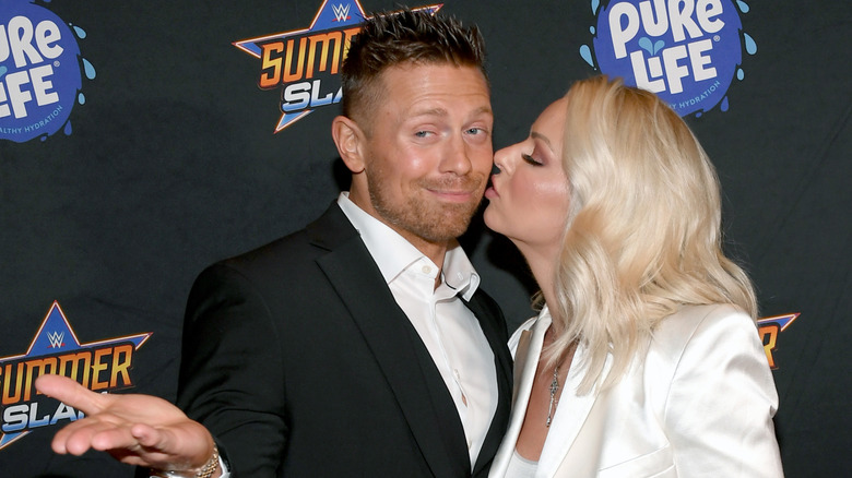The Miz getting kissed on the cheek by Maryse