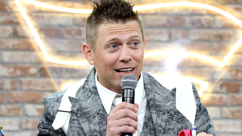 The Miz holding a microphone