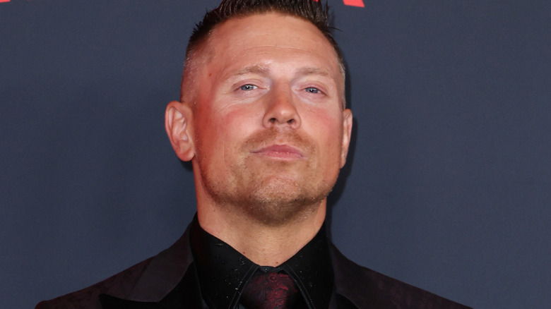 the miz poses on the Netflix red carpet