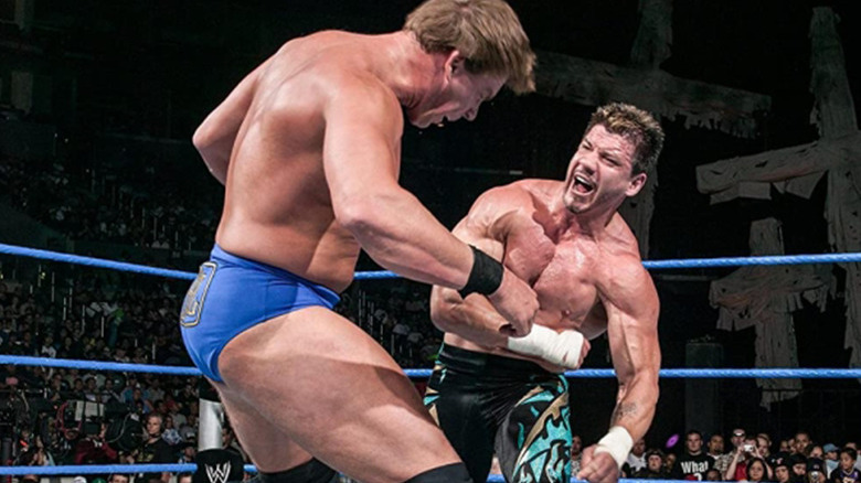 Eddie and JBL exchanging shots in the ring