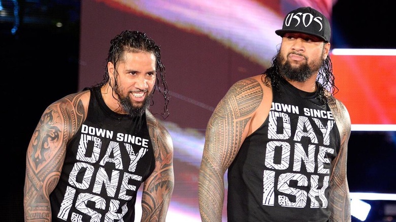 The Usos make their entrance.