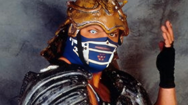 WCW's Glacier poses in his Sub Zero-inspired gear during a backstage photoshoot.