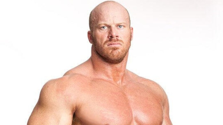 Nathan Jones is pictured in his wrestling gear in a photo posted to WWE.com.