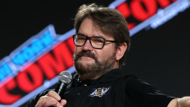 Tony Schiavone sitting on stage at New York Comic Con