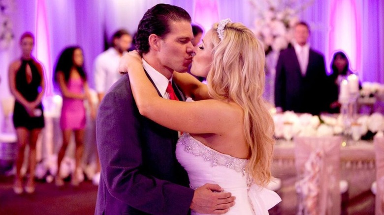 Natalya kisses her husband, TJ Wilson, during the first dance of their wedding in a photo posted to WWE.com.