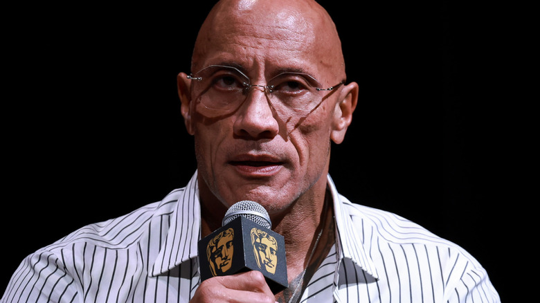 the rock speaking on microphone