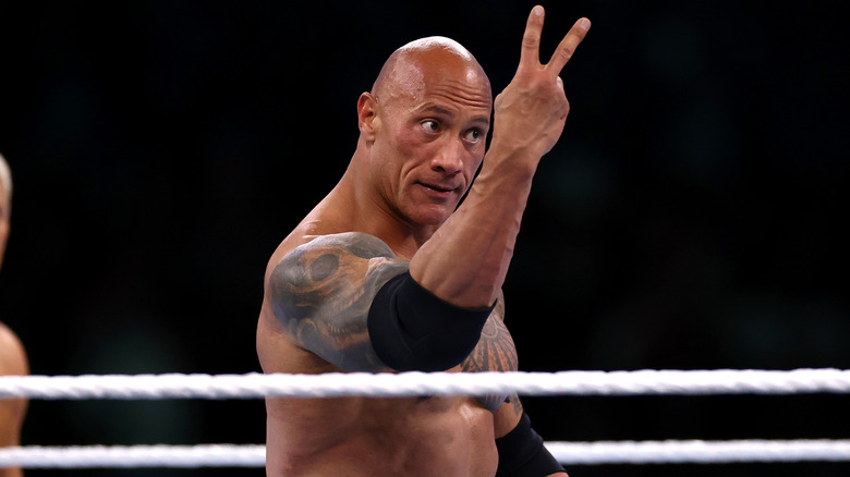 The Rock holds up two fingers