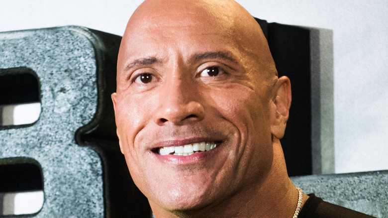 Dwayne Johnson smiling at premiere