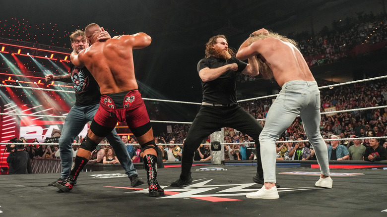 CM Punk and Sami Zayn fight Seth Rollins and Bron Breakker